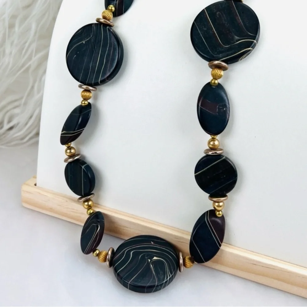 Pretty black swirl, and goldtone costume necklace